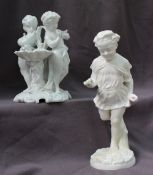 A Meissen porcelain table centrepiece in the form of two cherubs,