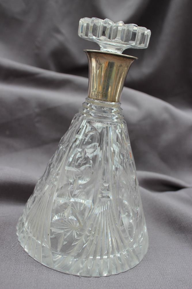 A George V silver topped and cut glass decanter, Birmingham,