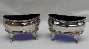 A pair of George III silver open table salts, of pointed oval form,