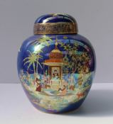 A Carltonware ginger jar and cover decorated in the Persian pattern to a blue ground, printed marks,