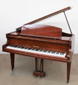 A Challen Baby Grand Piano, the mahogany case surmounted on three square section tapered legs,