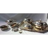 A large electroplated twin handled tray, the edge cast with flowers and swags,