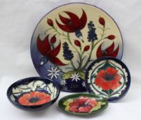 A Moorcroft pottery year plate 2001 decorated with Hibiscus in red and cream, 2000 No 286 of 750,