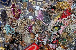 A large quantity of costume jewellery, including necklaces, bracelets, watches,