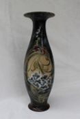 A Royal Doulton pottery vase of baluster form decorated in the Art Nouveau taste, initialled FEB,