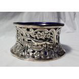 An Edward VII silver dish ring decorated with a stag, hounds, birds, flowers and leaves, Birmingham,
