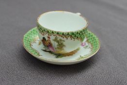 An Augustus Rex miniature cabinet tea cup and saucer,
