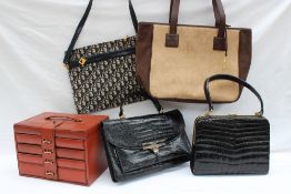 A Ralph Lauren suede leather and canvas handbag, together with two crocodile handbags,