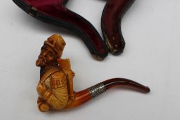 A carved Meershaum cheroot holder depicting a civil war soldier,