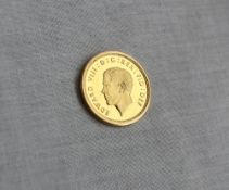 An Edward VIII fantasy gold sovereign, struck in 9ct gold dated 1936,