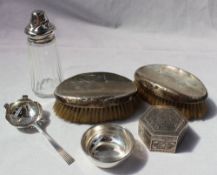 An Elizabeth II silver tea strainer and base, Sheffield, 1960,