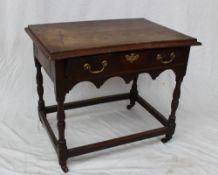 An 18th century oak low boy,