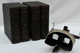 A Sun Sculpture U & U Stereoscopic viewer with a tin plate eyepiece together with two faux books