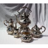 A Victorian silver four piece teaset, comprising hot water pot, teapot, sugar basin and cream jug,
