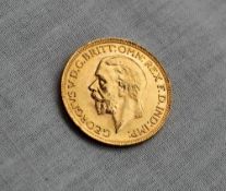 A George V gold sovereign dated 1931,