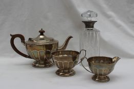 A George V silver three piece tea service, Birmingham, 1930,