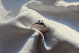 A solitaire diamond ring, the round old cut diamond approx 0.