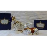 A Royal Crown Derby paperweight in the form of a ram, together with another of a reclining horse,