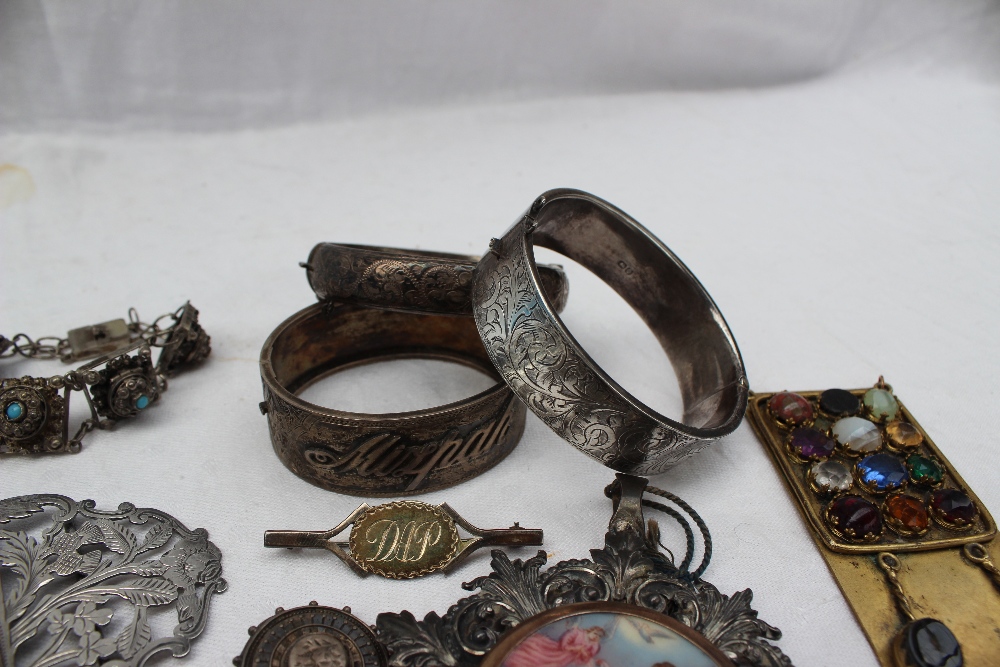 A quantity of silver and white metal jewellery, including hinged bangles, nurses belts, - Image 3 of 6