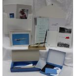 Concorde - a desk pen set together with a British Airways model,