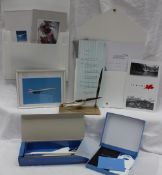 Concorde - a desk pen set together with a British Airways model,