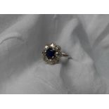 A sapphire and diamond cluster ring,