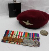 A set of seven World War II medals, including the 1939-1945 Star, The Africa Star, The Italy Star,
