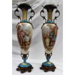 A large pair of 19th century Sevres style porcelain and ormolu mounted vases painted with courting