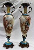 A large pair of 19th century Sevres style porcelain and ormolu mounted vases painted with courting