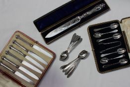 An Elizabeth II silver handled bread knife, Sheffield, 1951, cased,