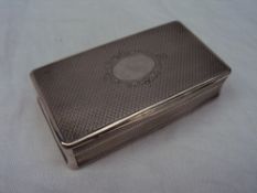 A French silver snuff box of rectangular form, with a central oval cartouche, 8.