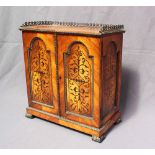 A 19th century continental kingwood table top cabinet,