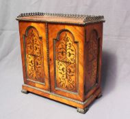 A 19th century continental kingwood table top cabinet,