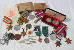 A collection of World War II medals including the 1939-45 Star, Italy Star, France and Germany Star,