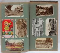 A postcard album, comprising circa 180 postcards including views of Richmond, Oxford, Windermere,