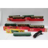 A Hornby Dublo 2232 Co-Co diesel electric locomotive together with a Hornby Dublo 2250 electric