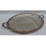 An electroplated on copper twin handled tray, cast with leaves and grapes,