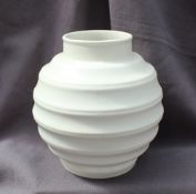 A Keith Murray style vase the stepped circular vase in ivory, impressed Made in England No.