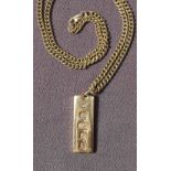 A 9ct yellow gold ingot, on a 9ct yellow gold crossover link necklace approximately 58.