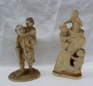 A late 19th century Oriental ivory figure group of a man and two children climbing a rock,