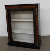 A Victorian ebonised and walnut bookcase,