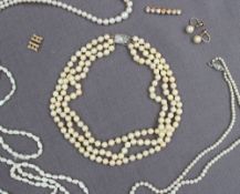 A three strand pearl choker,