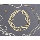 A three strand pearl choker,