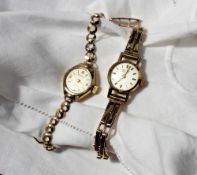 A 9ct yellow gold lady's wristwatch, the dial with batons inscribed "Vertex revue",