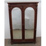 A continental mahogany wardrobe,