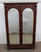 A continental mahogany wardrobe,