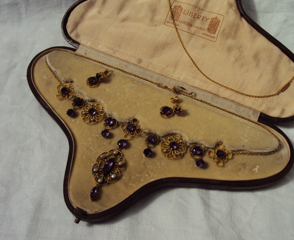 An amethyst and seed pearl necklace,