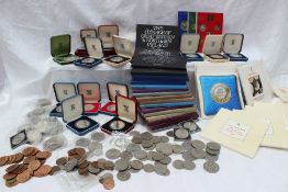 A large collection of coins including crowns, copper coins,