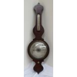 A 19th century rosewood and gilt highlighted onion topped barometer, with an alcohol thermometer,