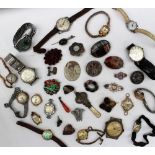 A Scottish hardstone brooch in the form of a thistle, together with assorted brooches, wristwatches,